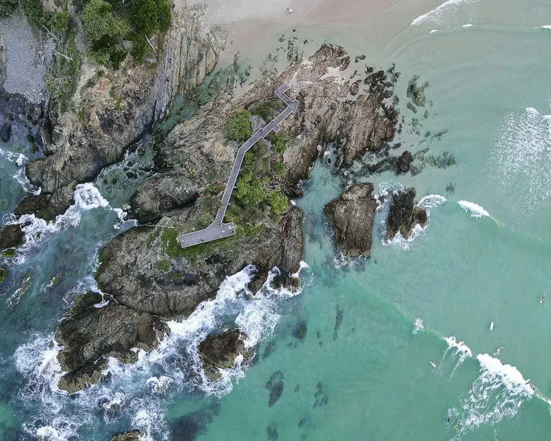 The rocks and boardwalk at The Pass from above